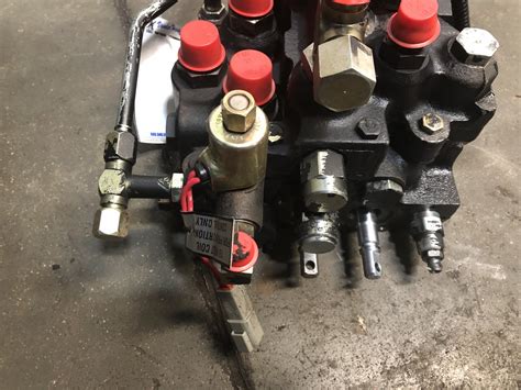 skid steer auxiliary hydraulics valve|bobcat 873 auxiliary hydraulic problems.